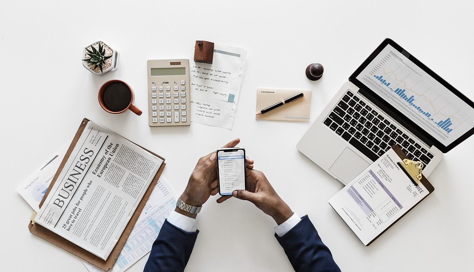 Birds-eye view of an individual with business items