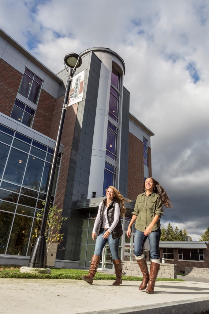 Students walk past The Tower on the campus of Central Maine Community College. The “late start” semester option at the college starts September 24.