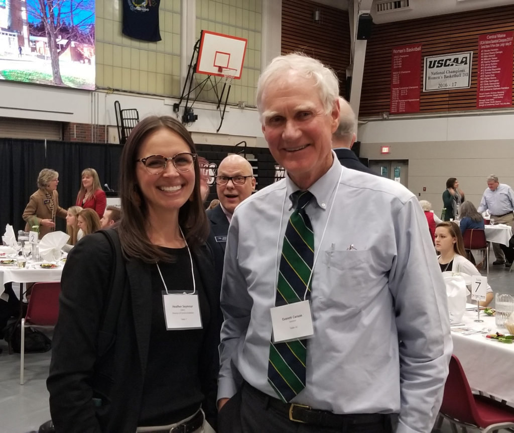 CMCC Director of Communications Heather Seymour poses with State Senator Brownie Carson of Harpswell in the Kirk Hall Gymnasium at CMCC.