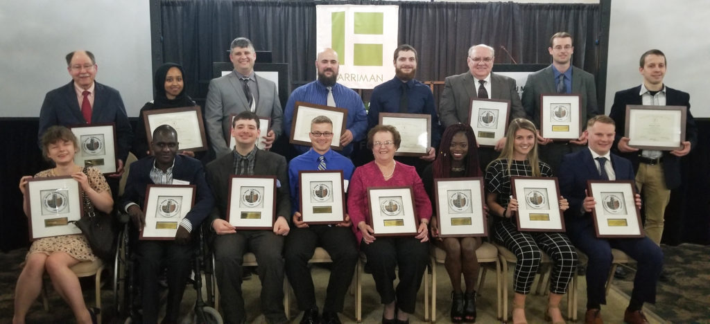 Seated left to right are Kayla Thayer, Student of the Year; Ouseiny Ousmane, “Against All Odds” Award; Matt Kinney, Scholarship Recipient of the Year; Shawn Brown, Veteran of the Year; Terry Samson, President’s Award; Kauna Yaga, “Against All Odds” Award; Kristen Huntress, Female Student of the Year; and Jordy Knoren, Male Student Athlete of the Year. Standing are John Wallace, Faculty Member of the Year; Zakiya Sheikyh, All-Maine Academic Team; Chris Thoma, Adjunct Faculty Member of the Year; Rusty Vining, All-Maine Academic Team; Bert LaBonte, Corporate Partner of the Year; Dan Graham, Staff Member of the Year; and Ben Creznic, All-Maine Academic Team. Missing from the photo is Tyler Hayes, All-Maine Academic Team.