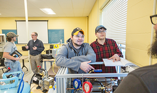 HVAC Students smiling during lab