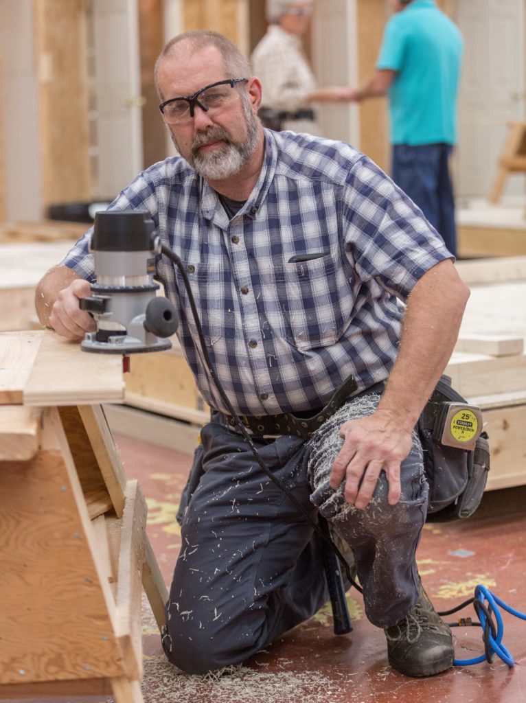 “Doc’ Hannaford scholarship winner Leon Twitchell poses while at work in the Building Construction Technology lab at CMCC.