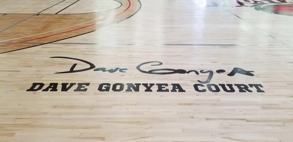 Dave Gonyea's signature on the gym floor in Kirk Hall